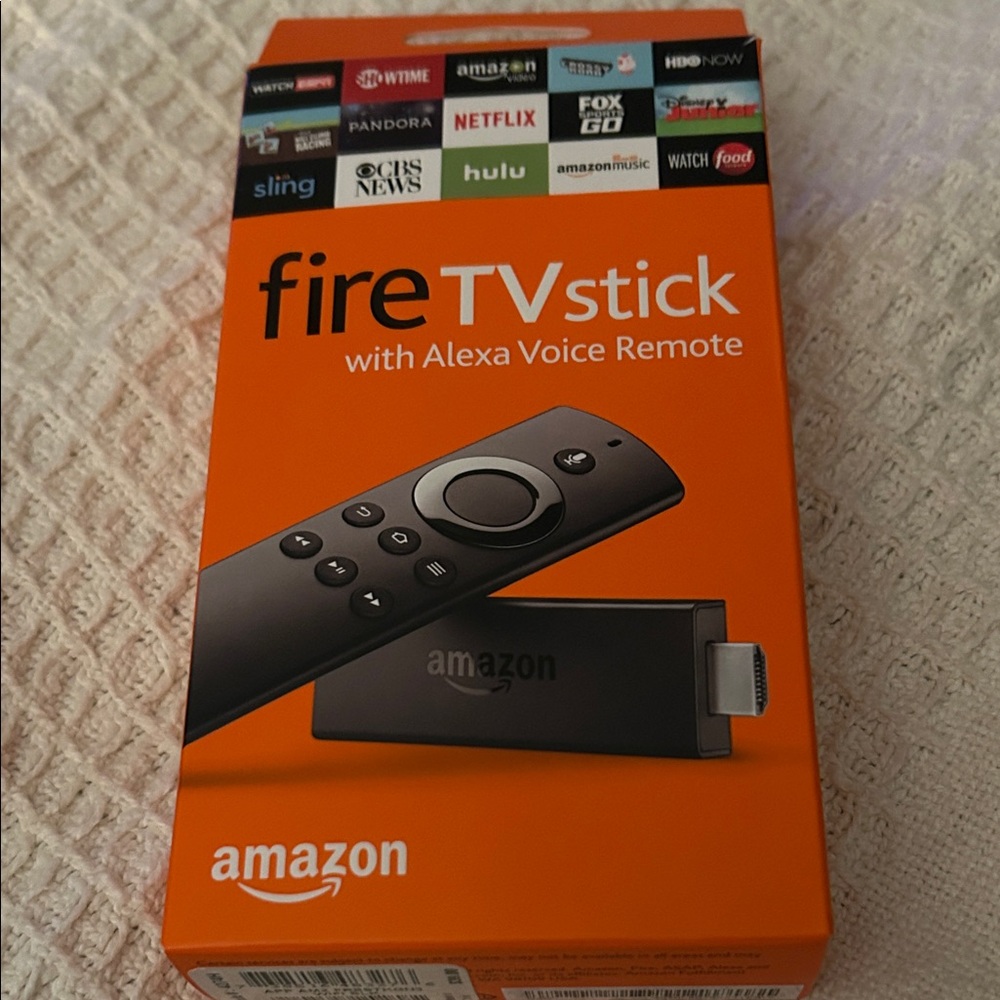 Amazon Fire TV Stick with Alexa Voice Remote - Black and Orange
